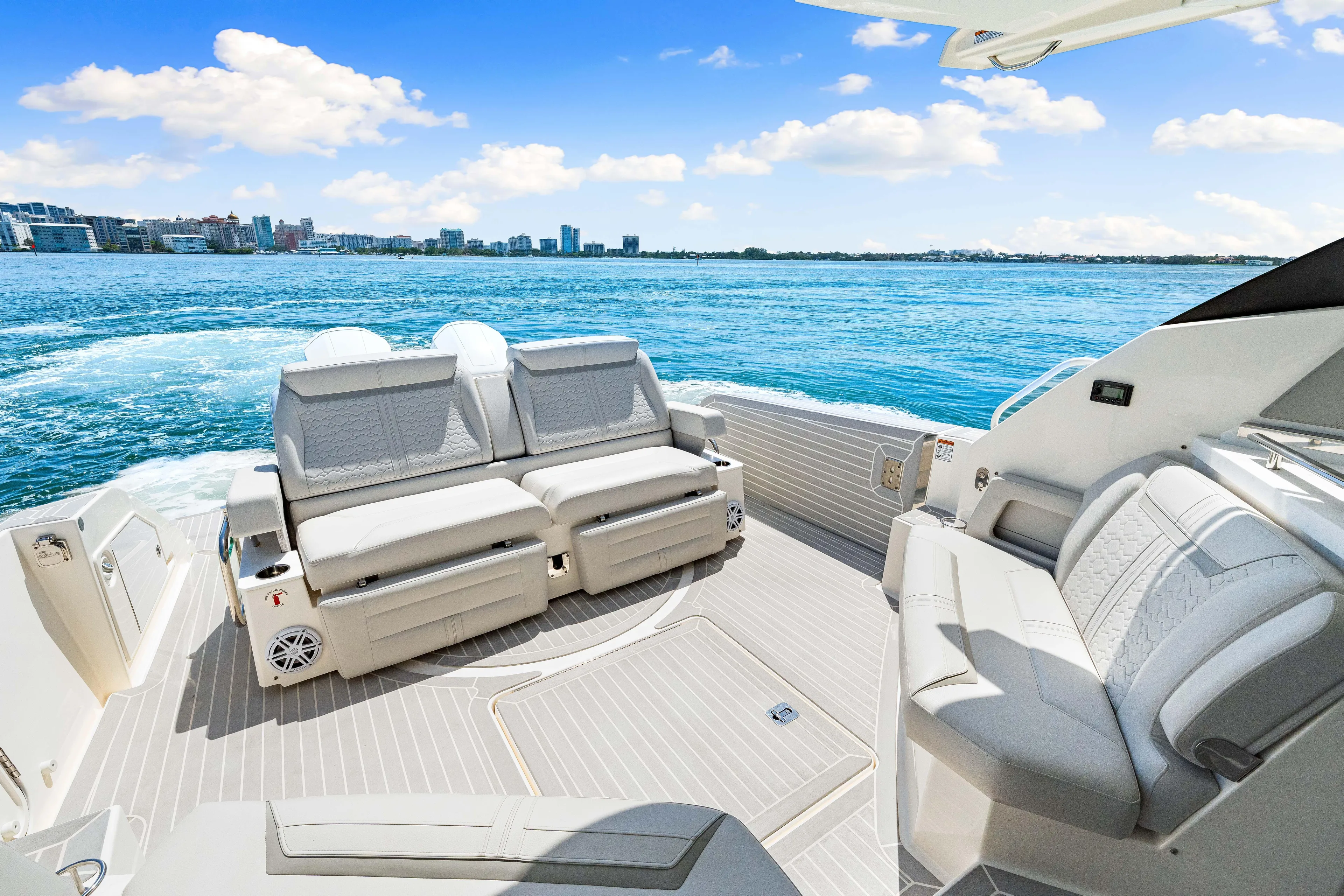  Yacht Photos Pics 2022 Tiara Yachts 43 LE luxury boat interior with ocean view and comfortable seating.