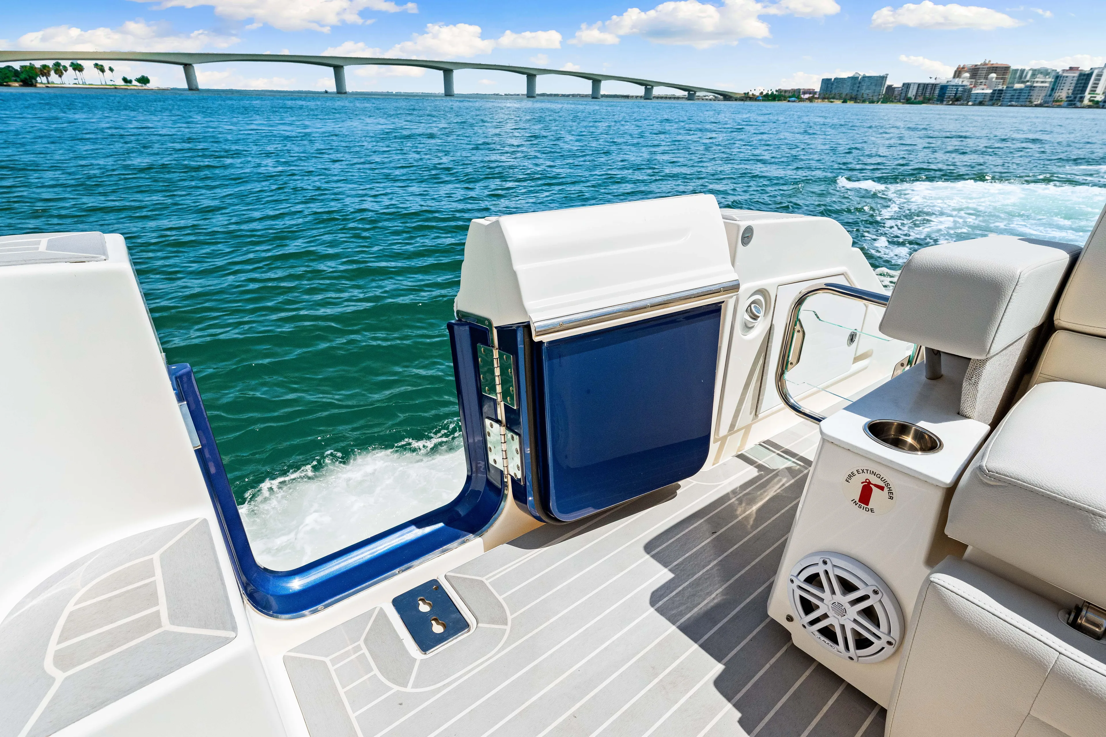  Yacht Photos Pics 2022 Tiara Yachts 43 LE boat interior with ocean view and bridge in background.