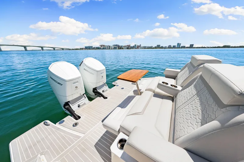  Yacht Photos Pics 2022 Tiara Yachts 43 LE with twin Mercury engines on a sunny day.