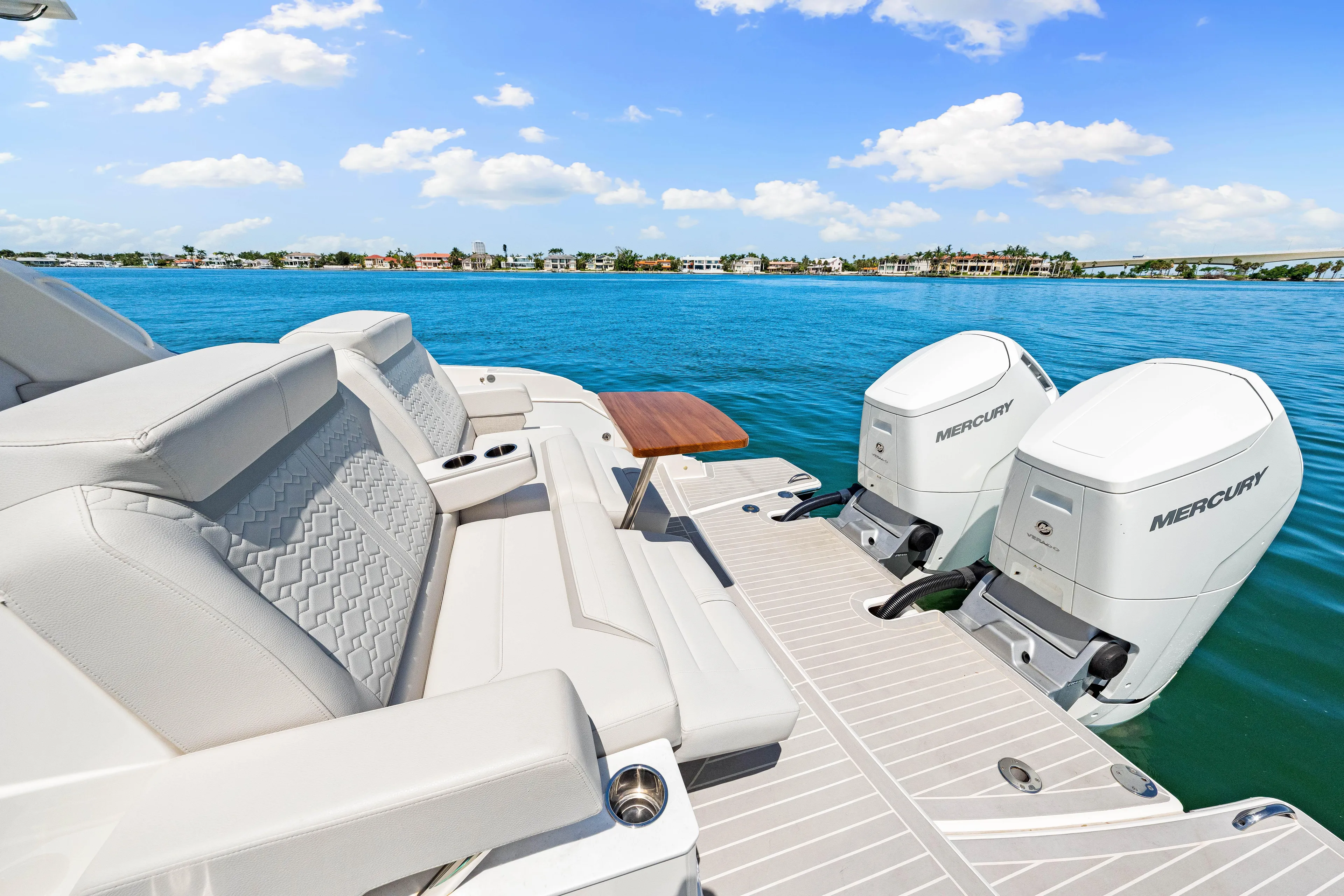  Yacht Photos Pics 2022 Tiara Yachts 43 LE with Mercury engines, luxurious seating, and ocean view.