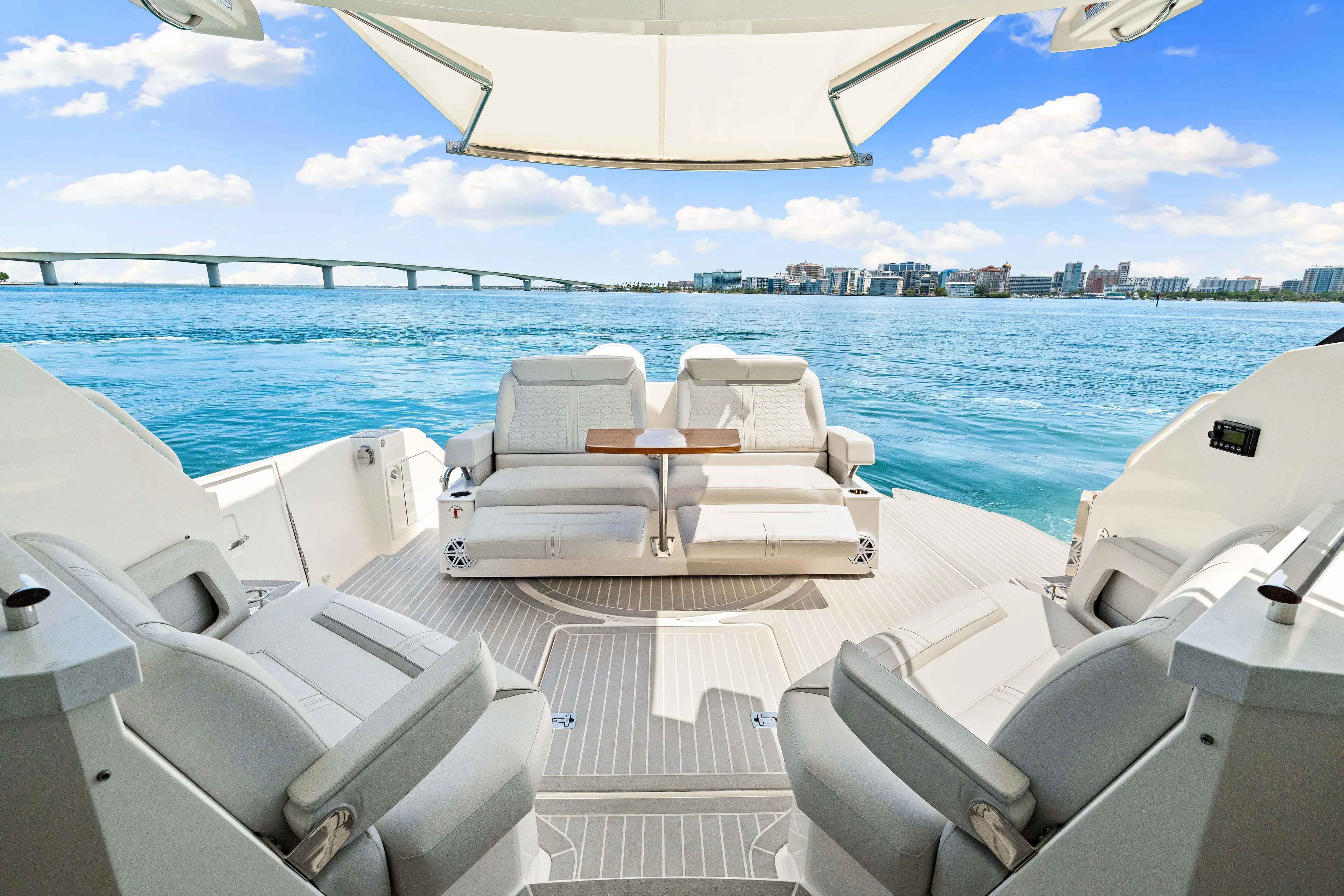  Yacht Photos Pics Luxurious 2022 Tiara Yachts 43 LE interior with ocean view and modern seating.