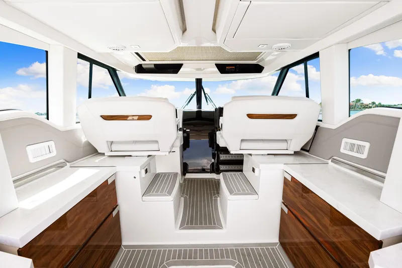  Yacht Photos Pics Interior of 2022 Tiara Yachts 43 LE, featuring luxurious seating and modern design.