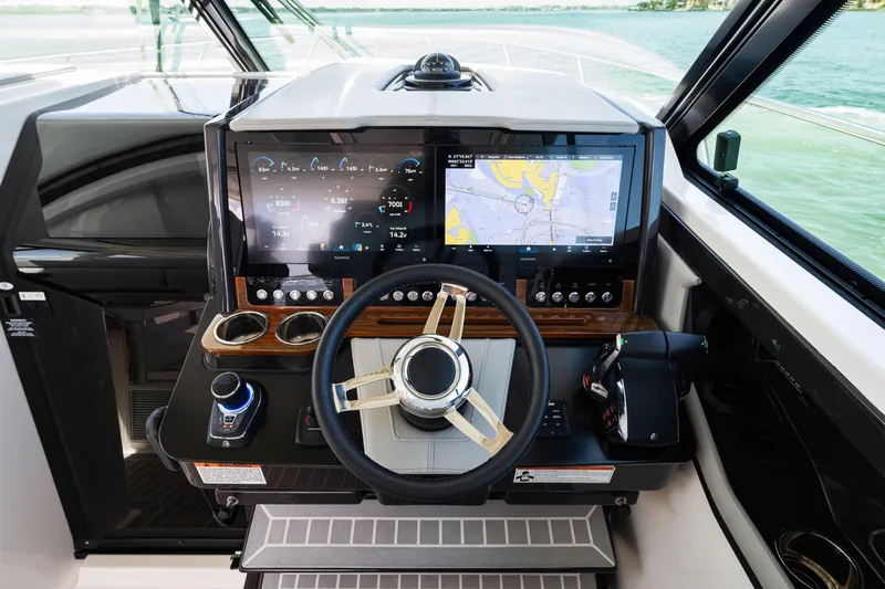  Yacht Photos Pics 2022 Tiara Yachts 43 LE helm with advanced navigation displays and controls.