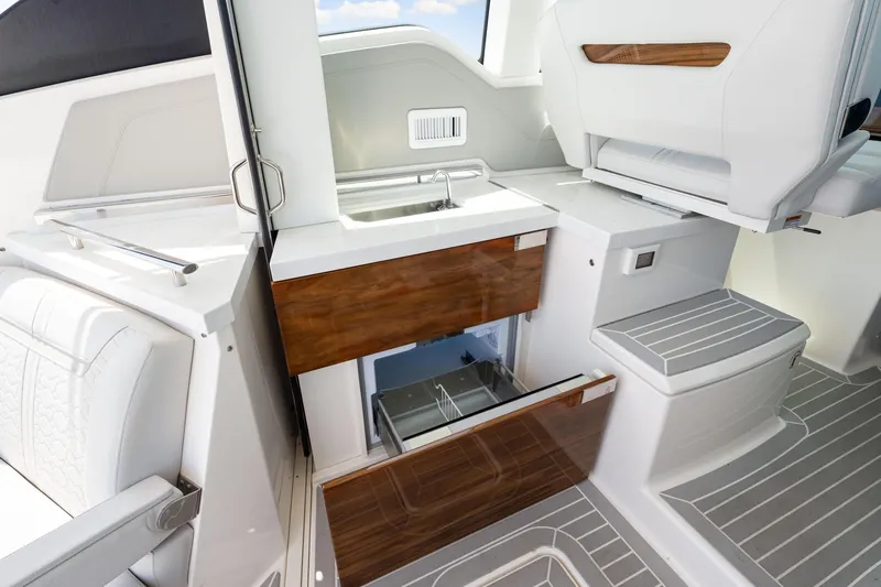  Yacht Photos Pics 2022 Tiara Yachts 43 LE interior with sleek cabinetry and modern design.