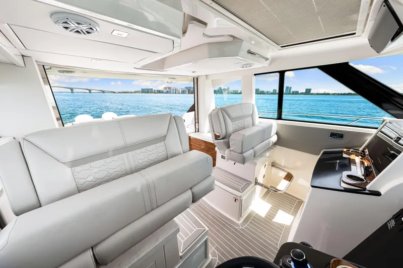  Yacht Photos Pics Luxurious interior of 2022 Tiara Yachts 43 LE with ocean view and modern seating.