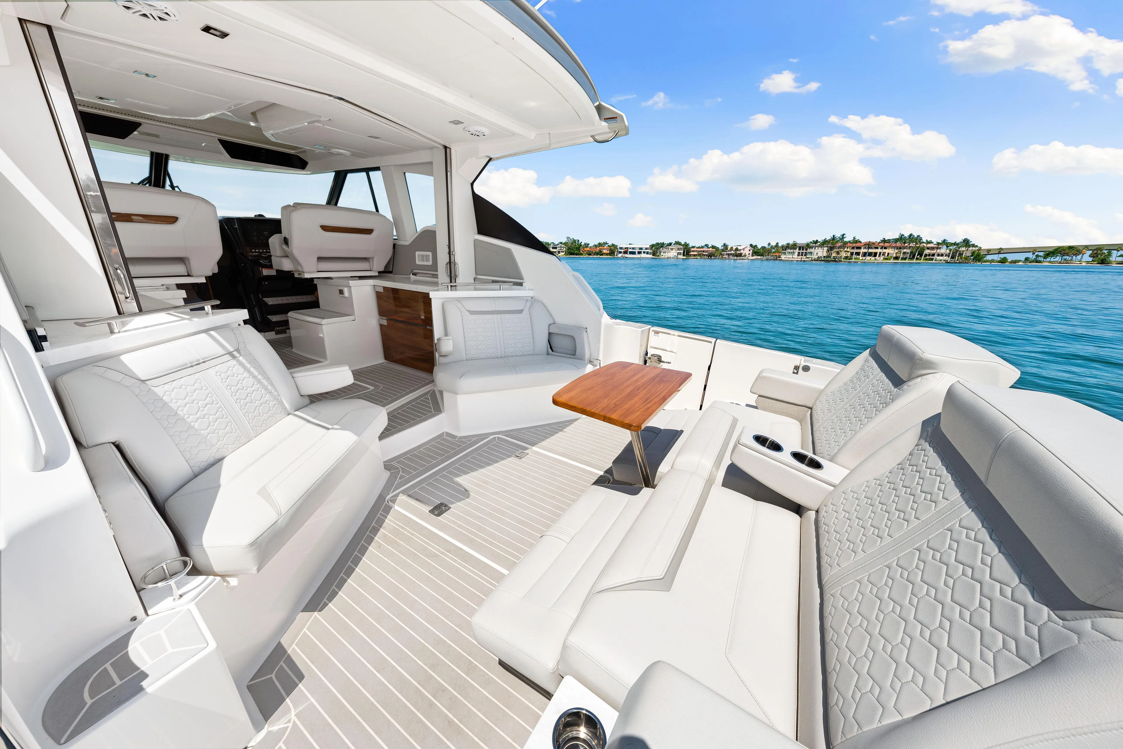  Yacht Photos Pics Luxurious 2022 Tiara Yachts 43 LE interior with elegant seating and ocean view.