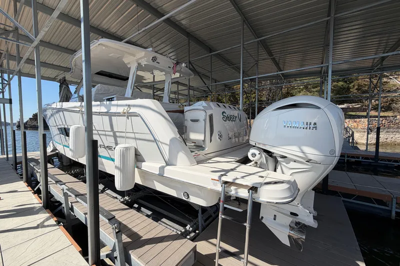  Yacht Photos Pics 2023 Regal 38 SAV boat docked with Yamaha outboard engine.