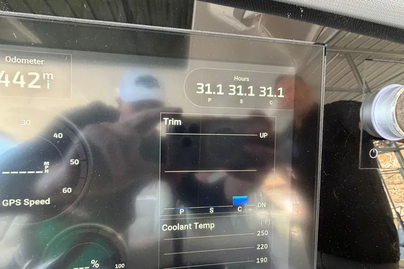  Yacht Photos Pics Display panel of 2023 Regal 38 SAV showing odometer and engine hours.