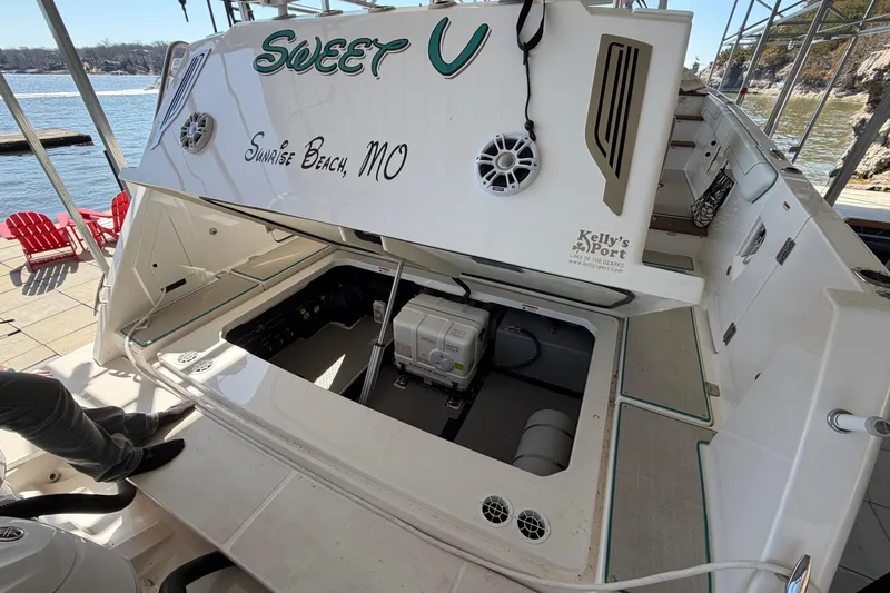  Yacht Photos Pics 2023 Regal 38 SAV boat with open engine compartment at dockside, Sunrise Beach, MO.