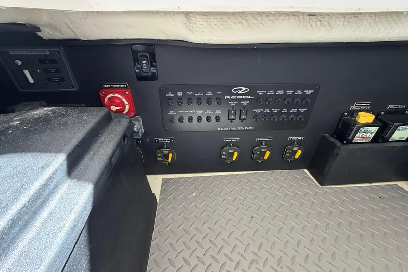  Yacht Photos Pics Control panel of 2023 Regal 38 SAV boat with various switches and indicators.