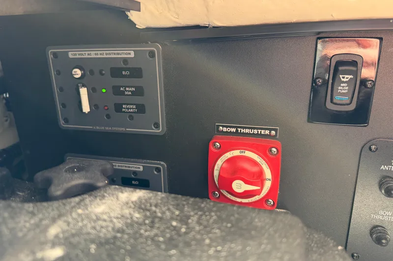  Yacht Photos Pics Control panel of 2023 Regal 38 SAV boat featuring bow thruster and bilge pump switches.