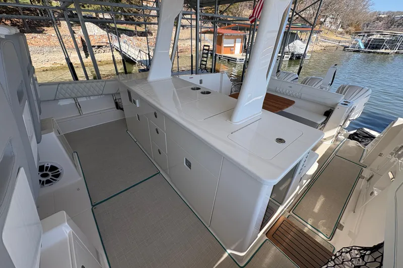  Yacht Photos Pics 2023 Regal 38 SAV boat interior with sleek design and modern amenities.