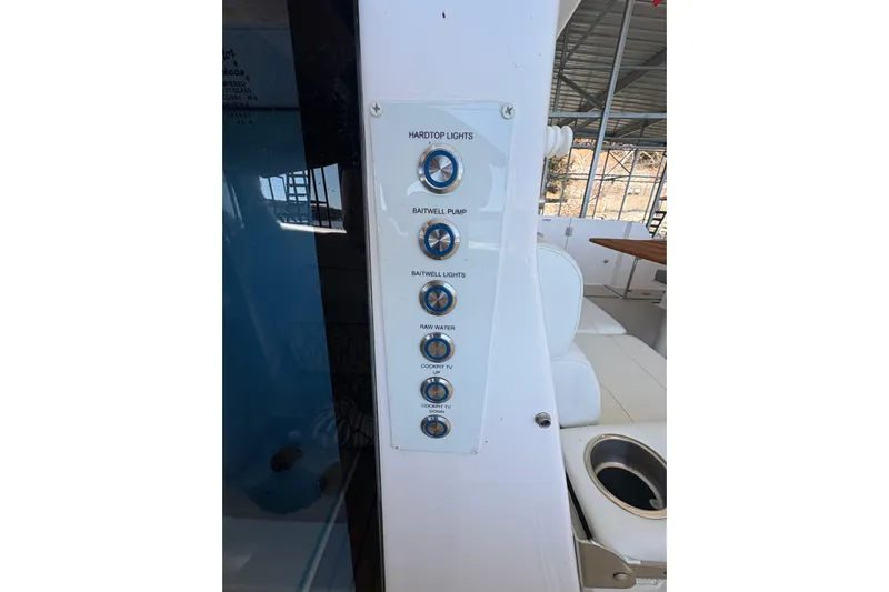  Yacht Photos Pics Control panel on 2023 Regal 38 SAV boat with labeled switches.