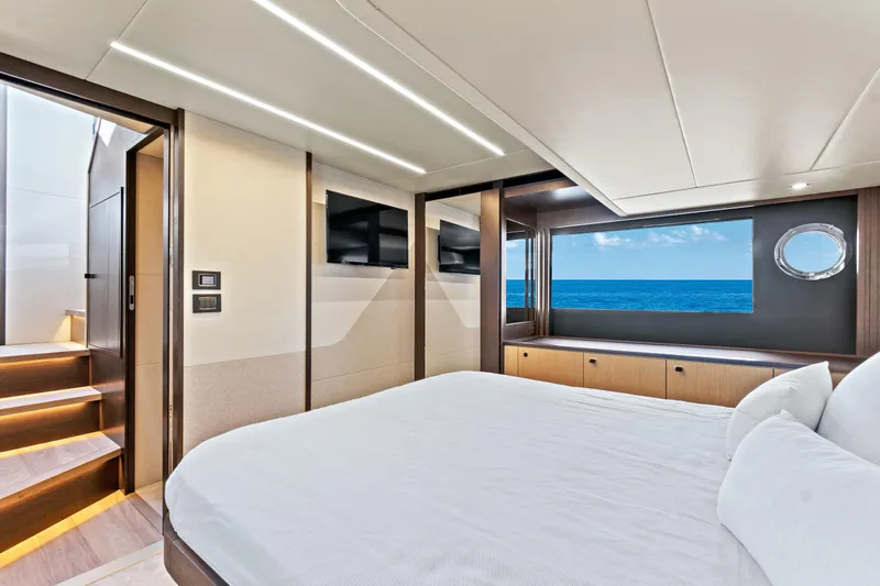 Joan's Rondevous Yacht Photos Pics Luxurious interior of 2025 Absolute 52 FLY yacht with ocean view and modern amenities.