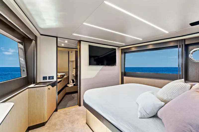 Joan's Rondevous Yacht Photos Pics Luxurious interior of 2025 Absolute 52 FLY yacht with ocean view and modern amenities.