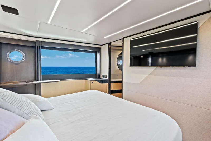 Joan's Rondevous Yacht Photos Pics Luxurious interior of 2025 Absolute 52 FLY yacht with ocean view and modern amenities.