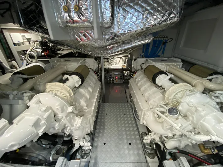  Yacht Photos Pics Engine room of 2020 Riva 66' Ribelle yacht, showcasing dual powerful engines.