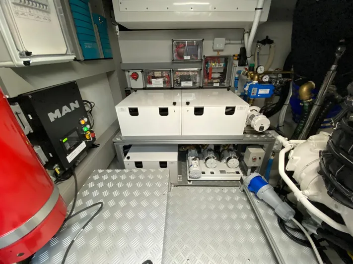  Yacht Photos Pics Engine room of 2020 Riva 66' Ribelle yacht with mechanical and electrical components.