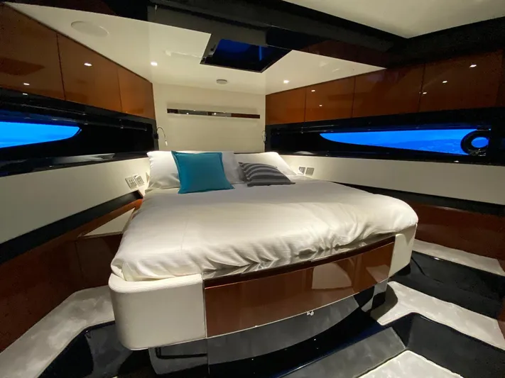  Yacht Photos Pics Luxurious bedroom interior of 2020 Riva 66' Ribelle yacht with modern design.