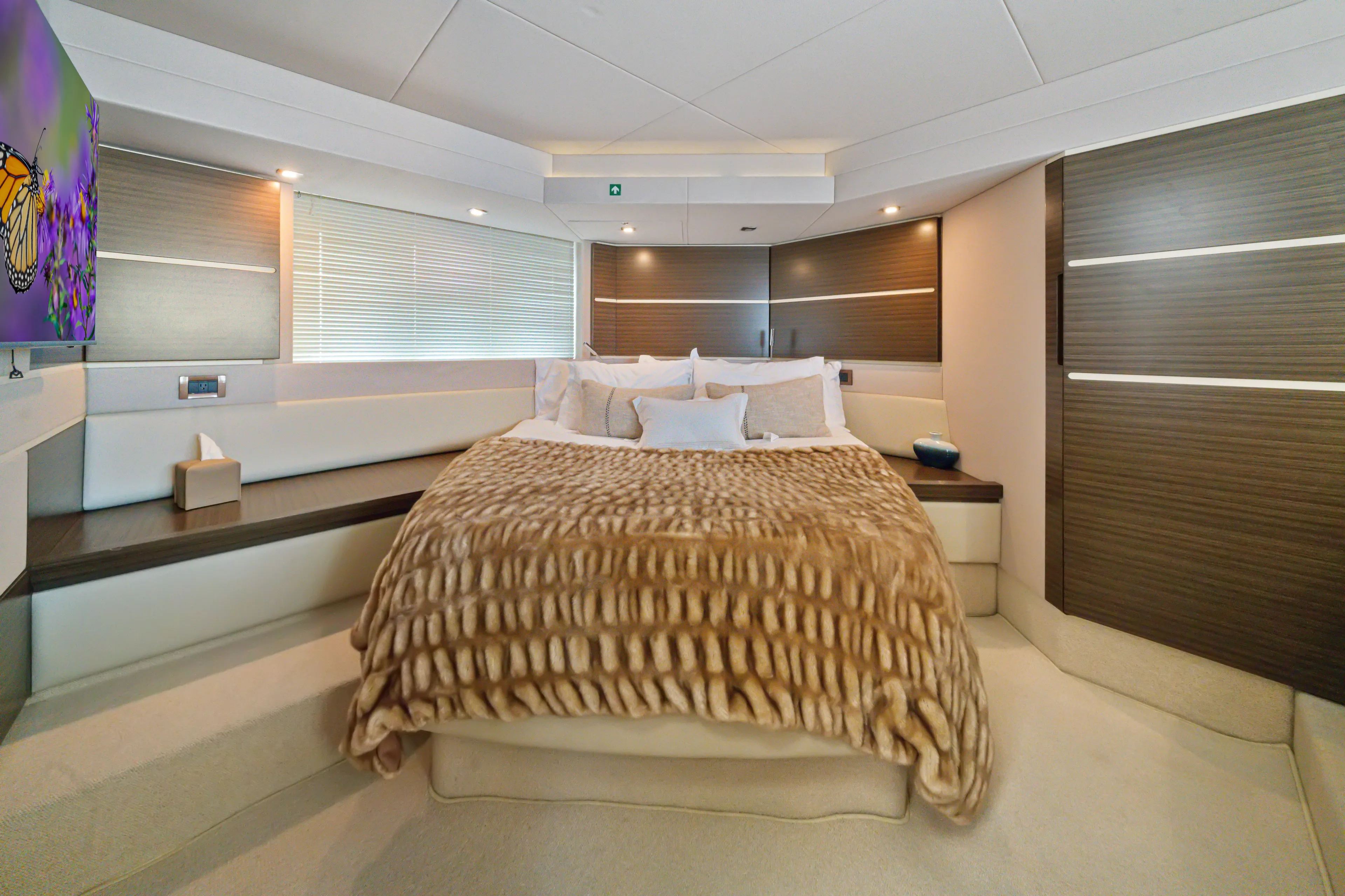  Yacht Photos Pics Luxurious bedroom interior of 2016 Azimut 54 Flybridge yacht with plush bedding.