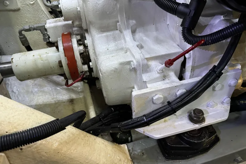  Yacht Photos Pics Engine compartment of a 1989 Seaton Trawler, showcasing mechanical components and wiring.