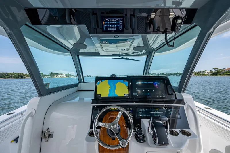  Yacht Photos Pics Helm of 2025 HCB 48 Campeon boat with advanced navigation displays and controls.