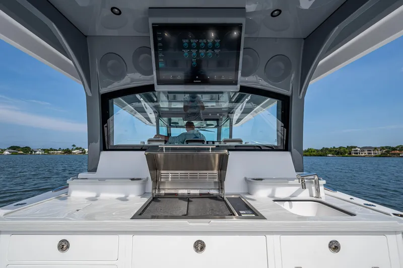  Yacht Photos Pics 2025 HCB 48 Campeon boat interior with grill and sink, featuring modern design and technology.