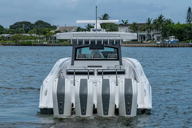  Yacht Photos Pics 2025 HCB 48 Campeon boat with four powerful outboard engines on the water.