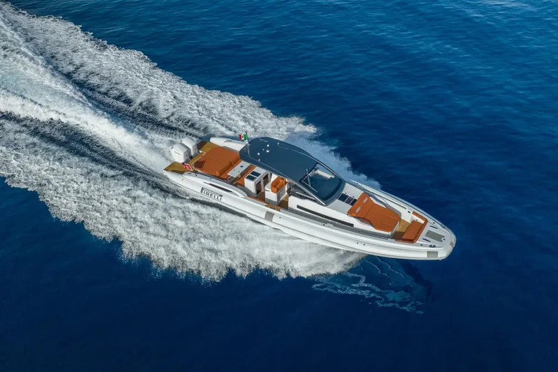  Yacht Photos Pics 2026 Pirelli 50 boat cruising on open blue water, showcasing sleek design and speed.