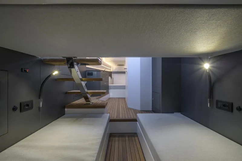  Yacht Photos Pics Interior of 2026 Pirelli 50 yacht, featuring modern design and wooden flooring.