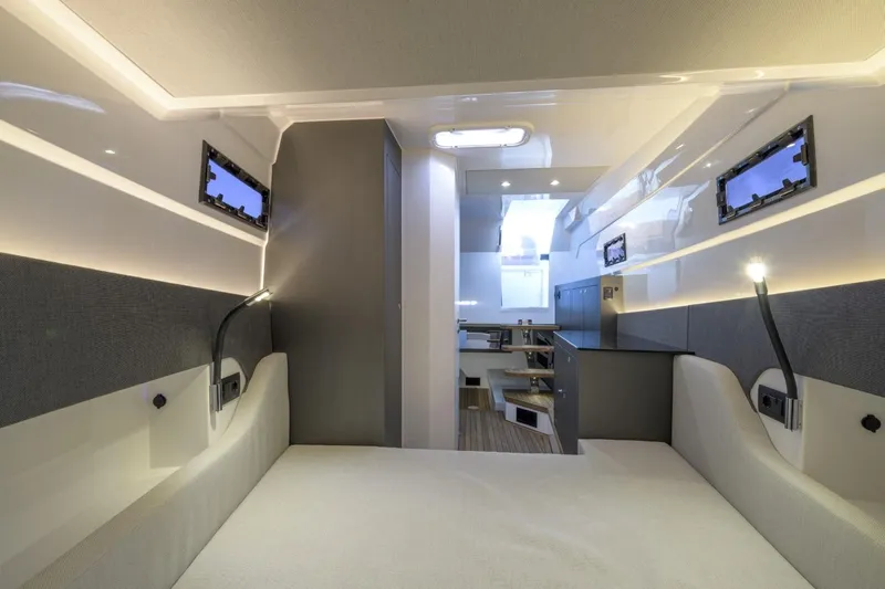  Yacht Photos Pics Luxurious interior of 2026 Pirelli 50 yacht, featuring modern design and ambient lighting.