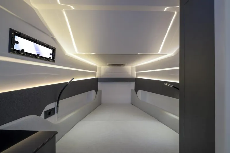  Yacht Photos Pics Interior of 2026 Pirelli 50 boat, featuring sleek modern design and ambient lighting.