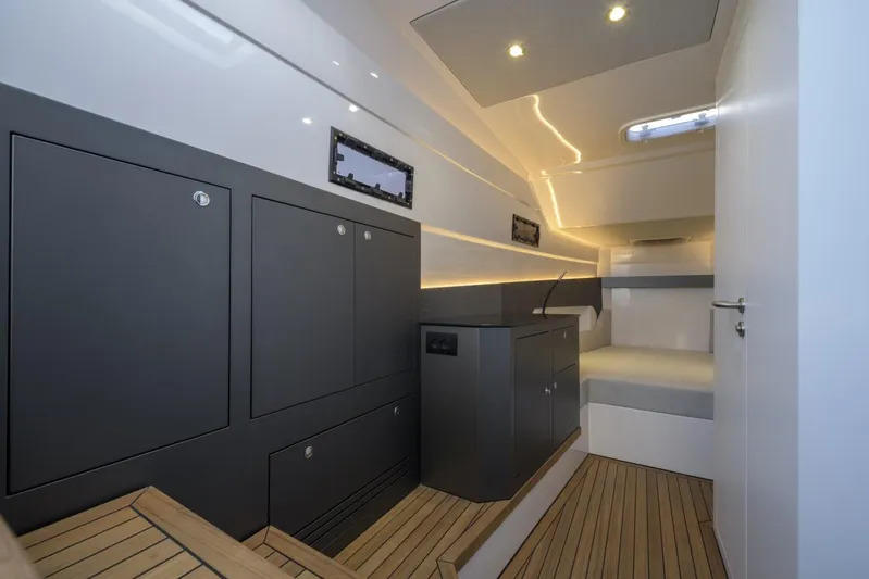  Yacht Photos Pics Modern interior of 2026 Pirelli 50 yacht with sleek design and ambient lighting.