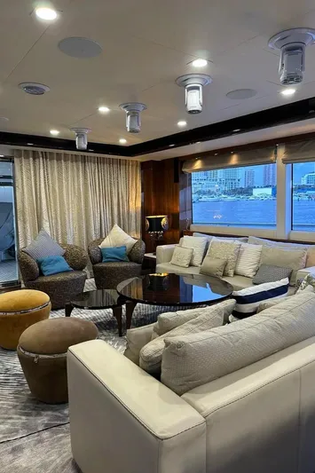 Blue Moon Yacht Photos Pics Luxurious interior of 2013 Princess M Class 32M yacht with elegant seating and modern decor.