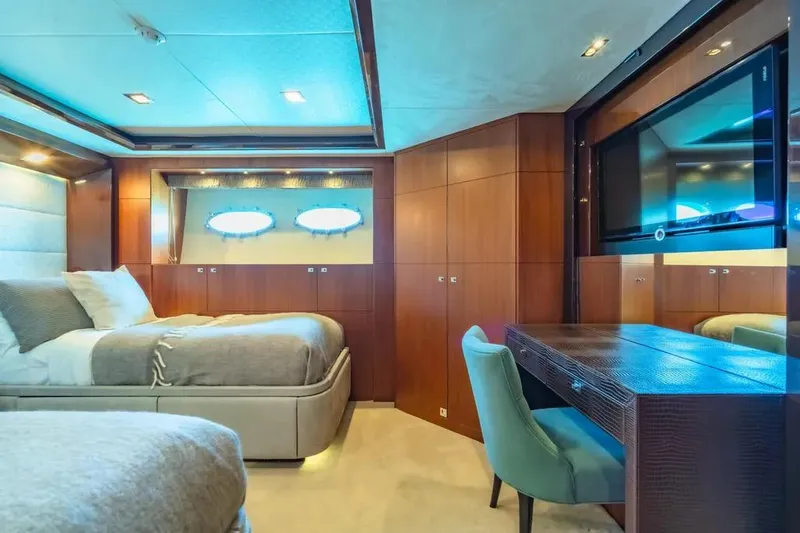 Blue Moon Yacht Photos Pics Luxurious bedroom interior on 2013 Princess M Class 32M yacht with modern furnishings.
