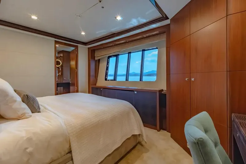 Blue Moon Yacht Photos Pics Luxurious bedroom interior on 2013 Princess M Class 32M yacht with ocean view.