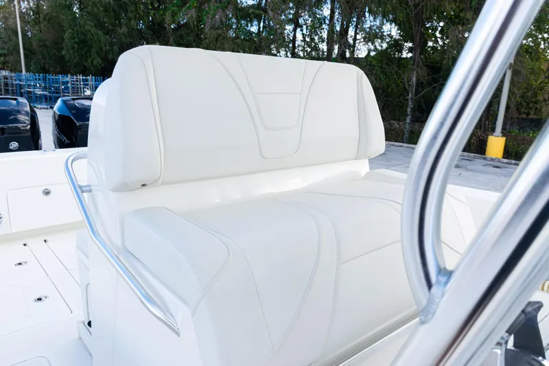  Yacht Photos Pics 2021 SeaVee 322Z boat with white cushioned seating and stainless steel railing.