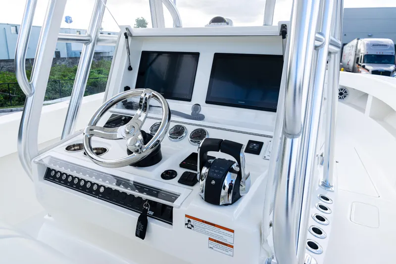  Yacht Photos Pics 2021 SeaVee 322Z boat helm with dual screens and modern controls.