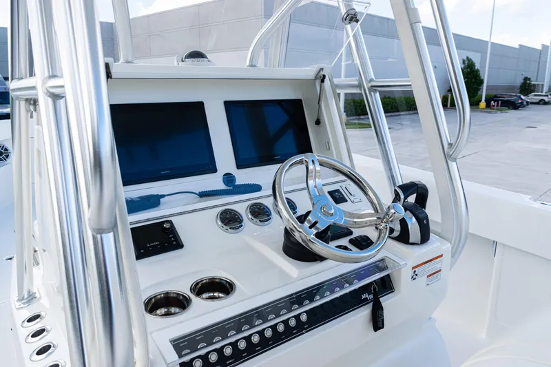  Yacht Photos Pics 2021 SeaVee 322Z boat console with dual screens and stainless steel steering wheel.
