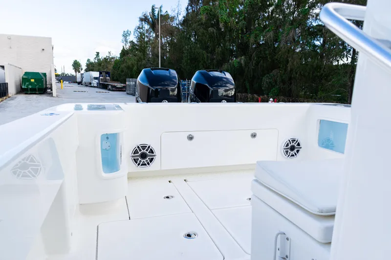  Yacht Photos Pics 2021 SeaVee 322Z boat deck with dual engines and seating area.