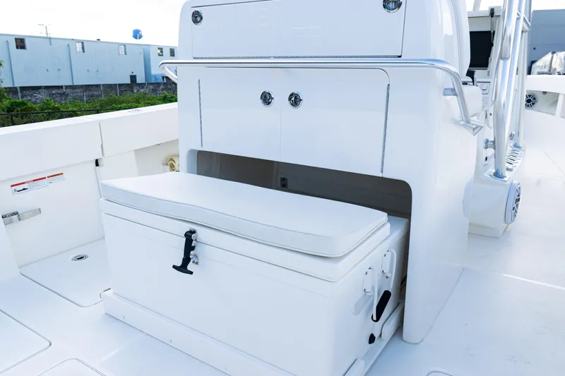  Yacht Photos Pics 2021 SeaVee 322Z boat interior with storage compartment and cushioned seat.