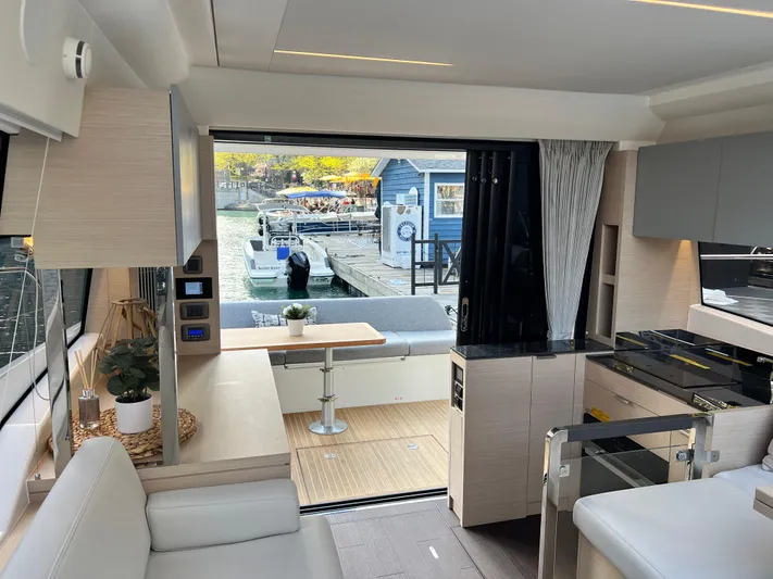  Yacht Photos Pics Luxurious interior of 2023 Prestige 420S yacht with open deck view.