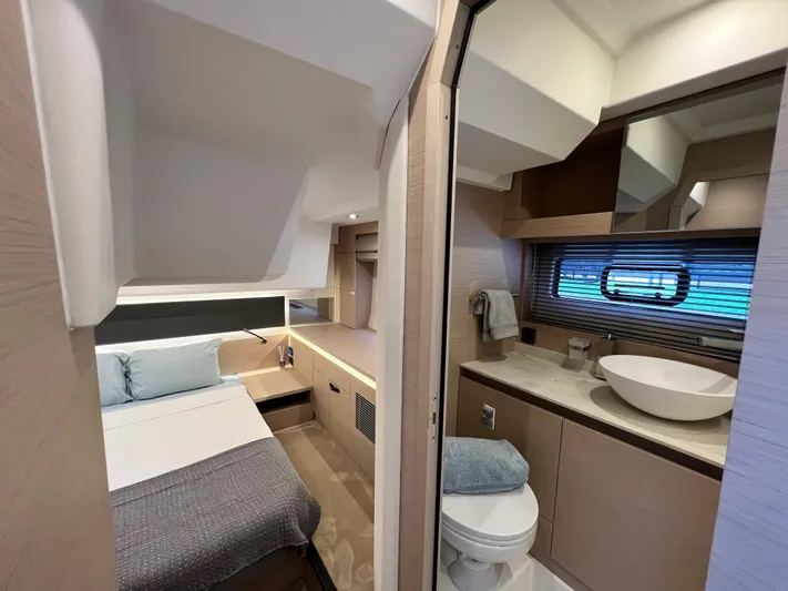  Yacht Photos Pics Luxurious interior of 2023 Prestige 420S yacht featuring bedroom and bathroom.