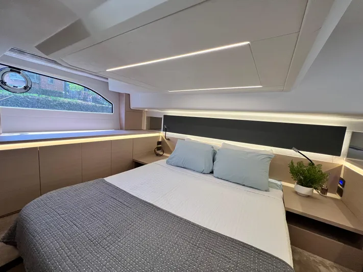  Yacht Photos Pics Luxurious 2023 Prestige 420S yacht bedroom with modern design and elegant lighting.