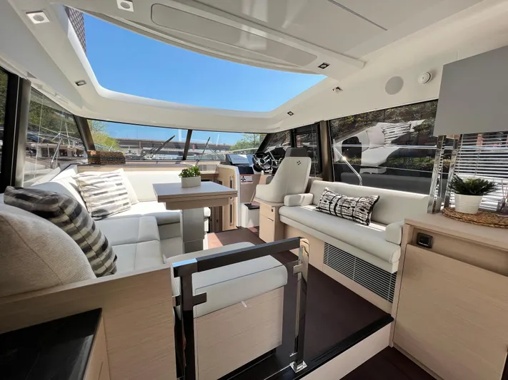  Yacht Photos Pics Luxurious interior of 2023 Prestige 420S yacht with modern seating and panoramic windows.