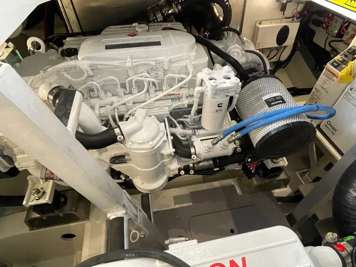  Yacht Photos Pics 2023 Prestige 420S engine compartment showcasing a modern marine engine setup.