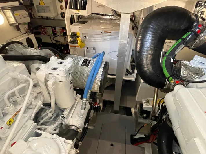  Yacht Photos Pics Engine room of 2023 Prestige 420S yacht, showcasing mechanical components and systems.