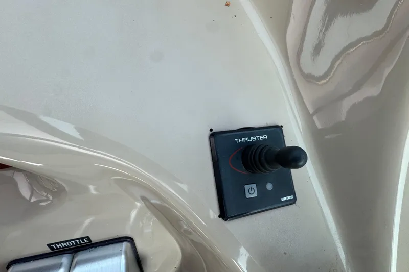 Go Girl Yacht Photos Pics Control panel of a 2001 Sea Ray 510 Sundancer with thruster joystick and throttle.