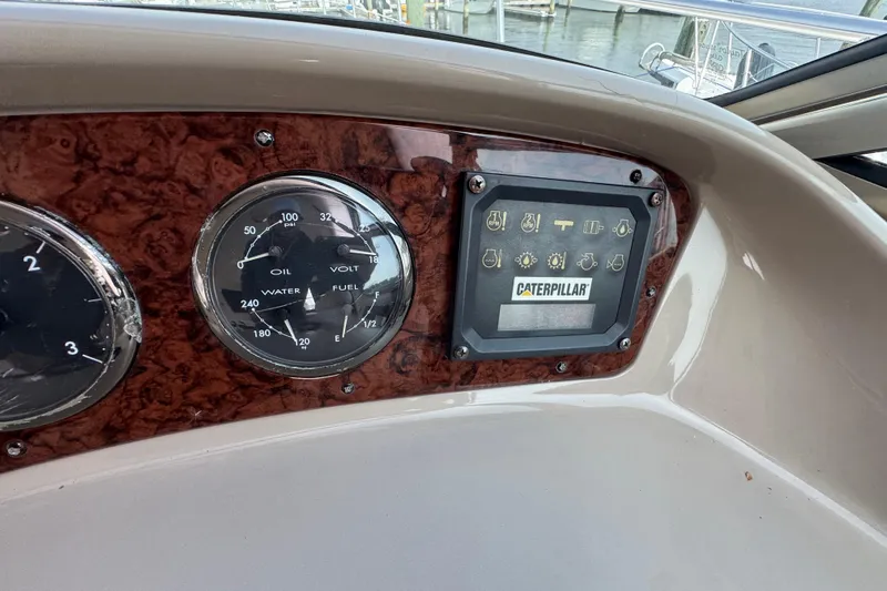 Go Girl Yacht Photos Pics Dashboard of 2001 Sea Ray 510 Sundancer with gauges and Caterpillar display.