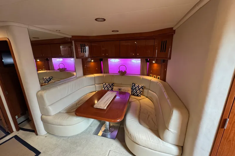Go Girl Yacht Photos Pics Luxurious interior of 2001 Sea Ray 510 Sundancer yacht with plush seating and elegant decor.